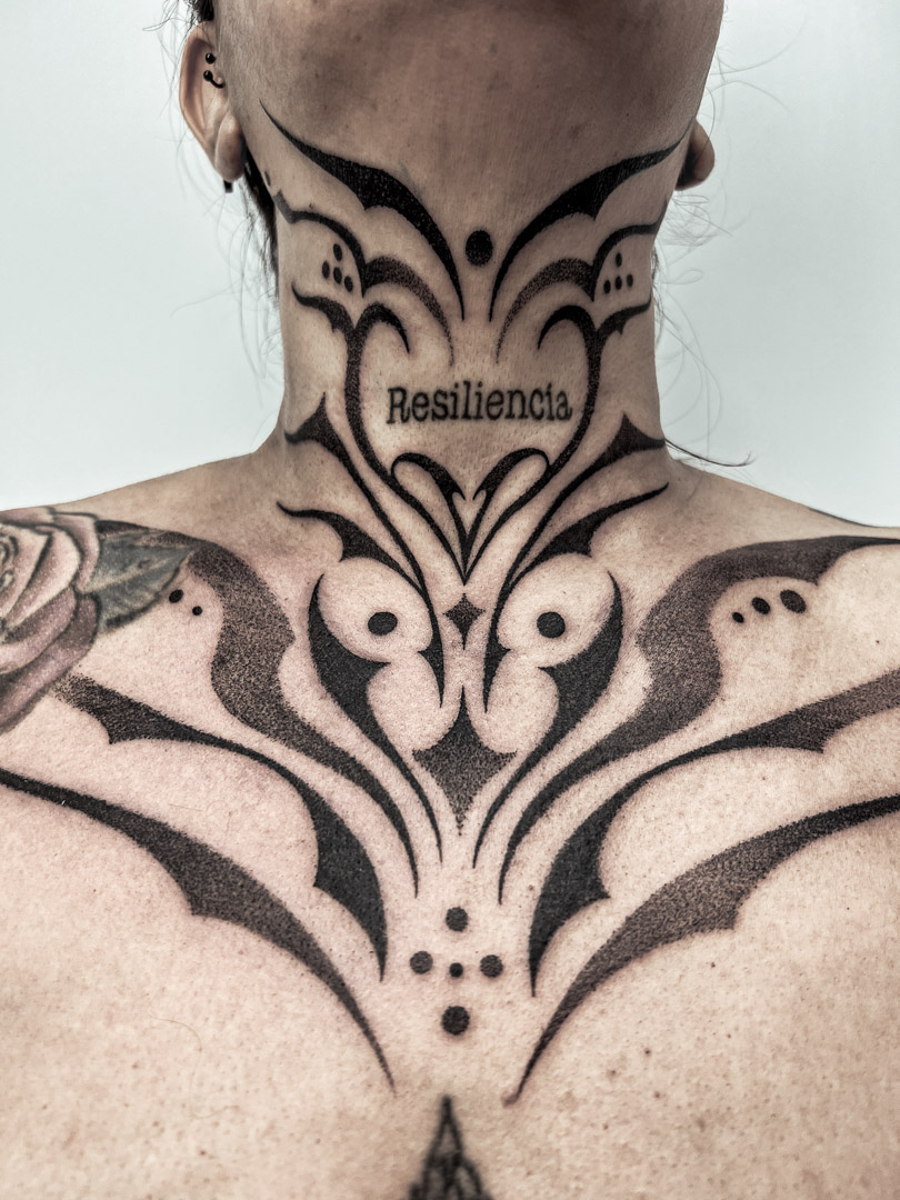 Professional blackwork tattoo with bold lines by BOGA Oakland California